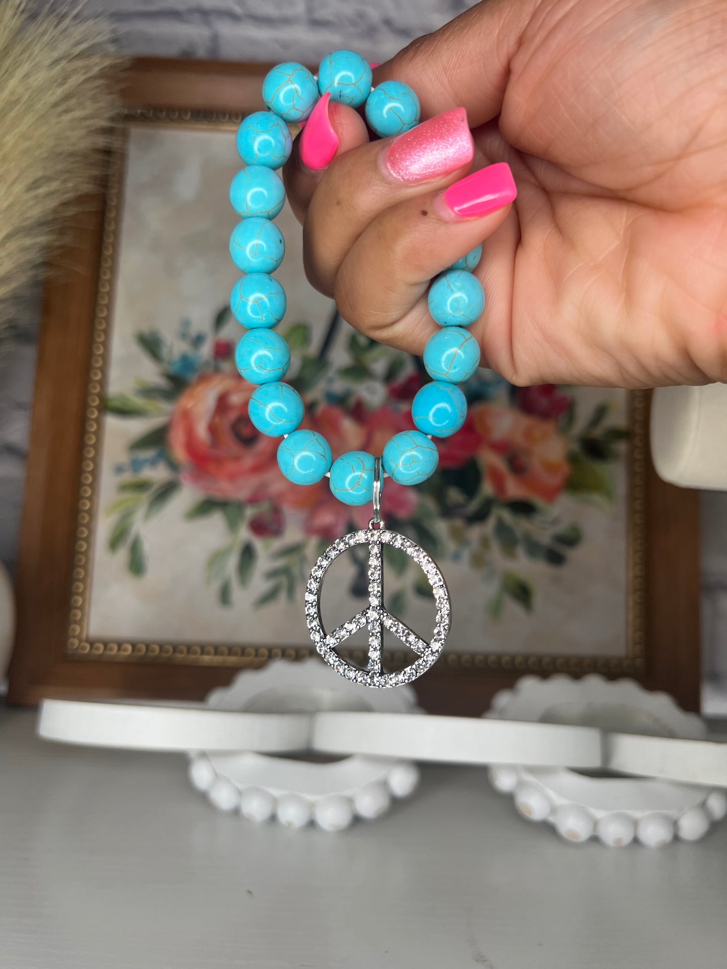 Turquoise bracelet with peace, sign pendant
